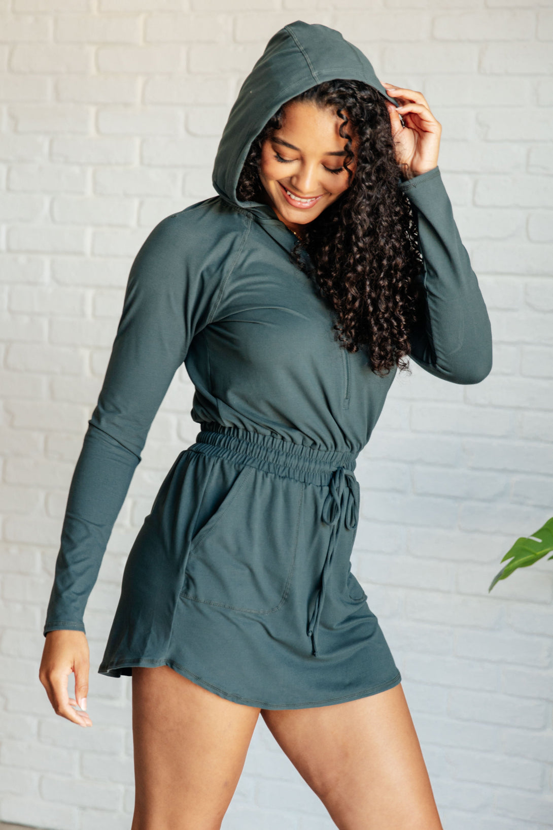 Getting Out Long Sleeve Hoodie Romper in Smoked Spruce - Lavish Fix